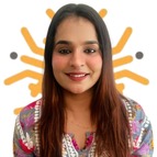 A woman in a flower patterned shirt, with long hair.